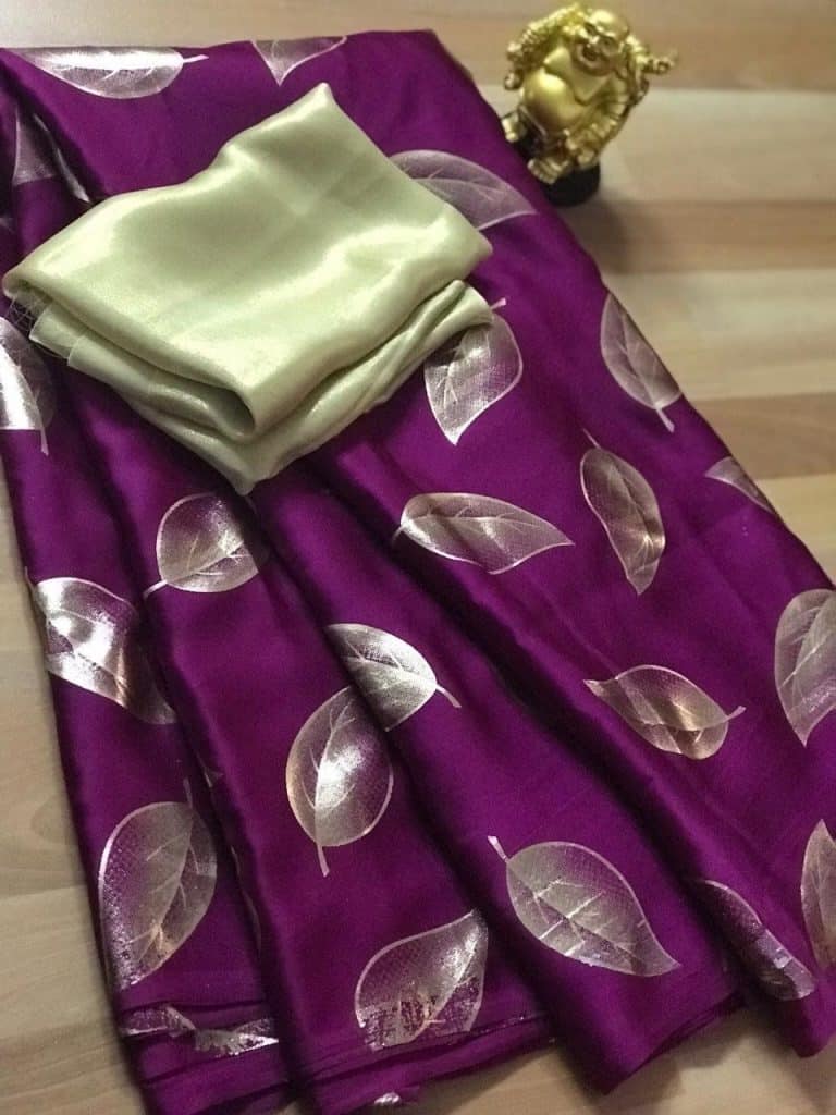 Purple silk saree with gold leaf print.