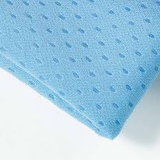 A water absorbent blue cloth with dots.