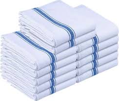 A stack of white towels with blue stripes.