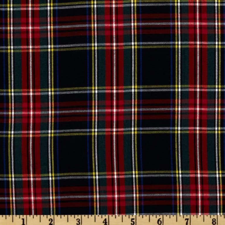 A black and red plaid fabric with a ruler.