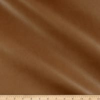 A brown crazy horse fabric with a ruler.